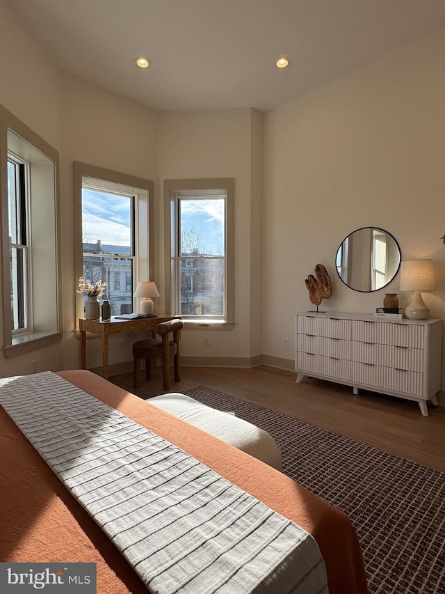 bedroom featuring wood-type flooring