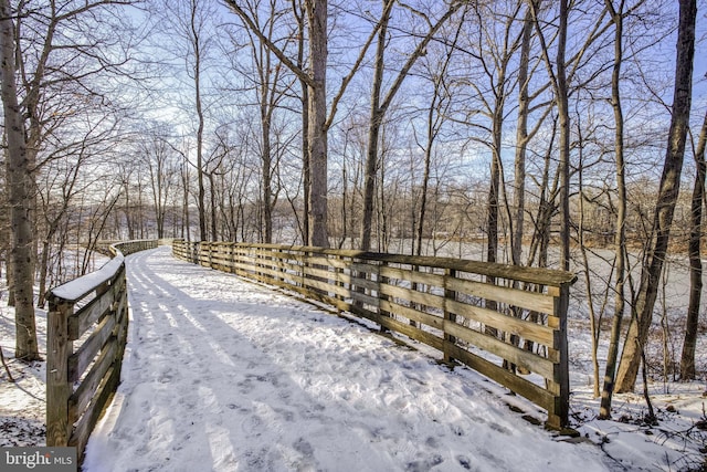 view of snow covered deck