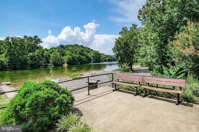 view of patio featuring a water view