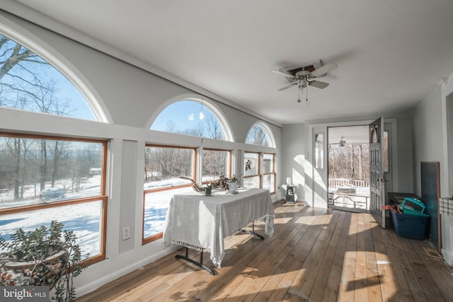 sunroom / solarium with ceiling fan