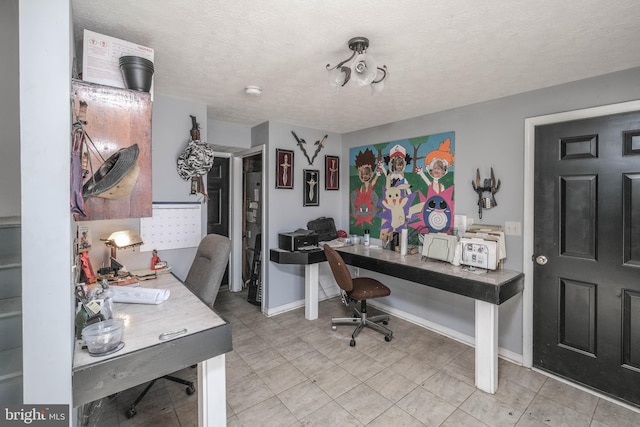 office with a textured ceiling