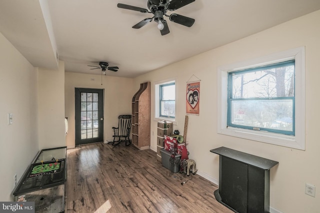 interior space featuring ceiling fan and hardwood / wood-style floors