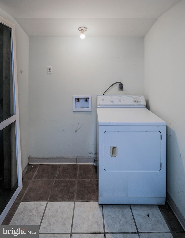 laundry room with washer / dryer