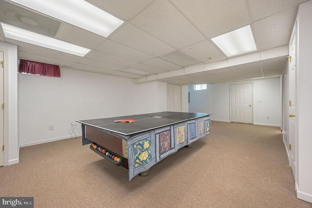 rec room featuring carpet, a paneled ceiling, and baseboards