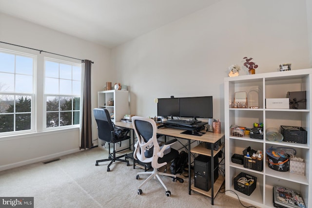 view of carpeted office space