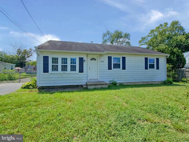 view of front of house with a front lawn