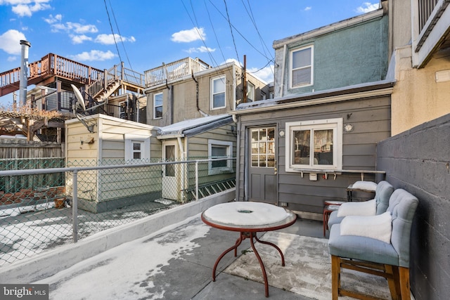 rear view of property with a patio