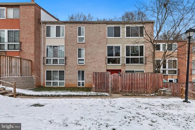 view of snow covered property