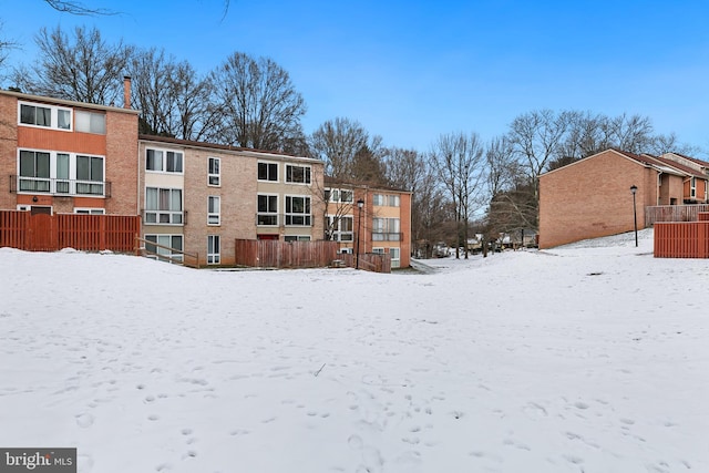 view of snow covered house