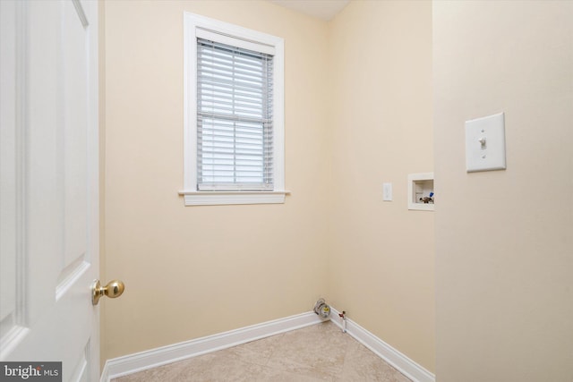 laundry room with washer hookup, gas dryer hookup, and light tile patterned flooring