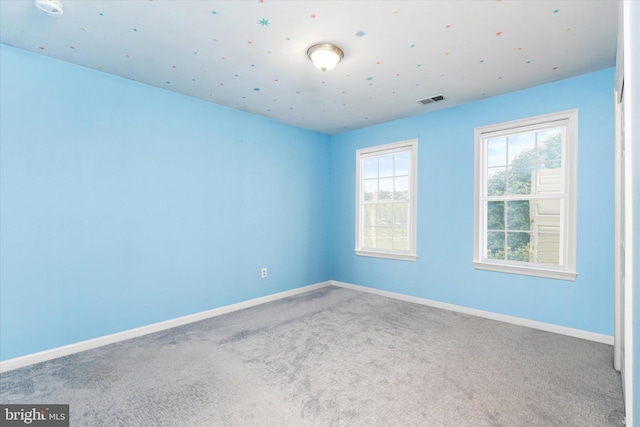 spare room with carpet flooring