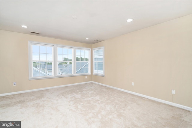 view of carpeted spare room