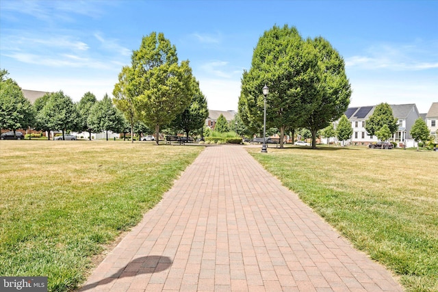 view of community featuring a lawn