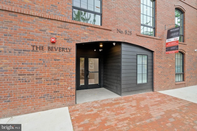 entrance to property featuring french doors