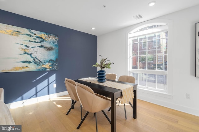 dining room with light hardwood / wood-style floors