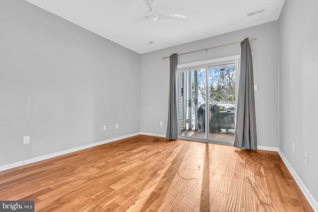 unfurnished room with ceiling fan and light hardwood / wood-style flooring