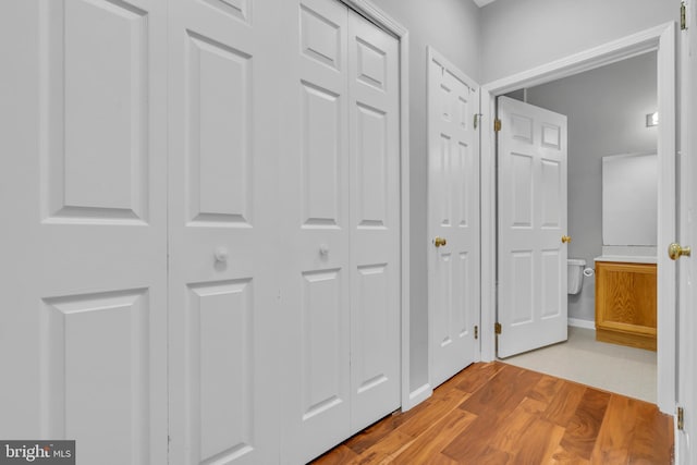 corridor featuring light wood-type flooring