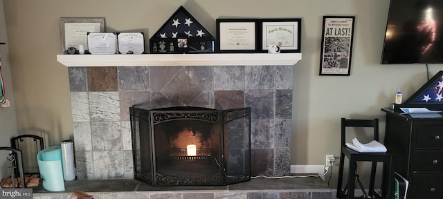 room details with a tile fireplace