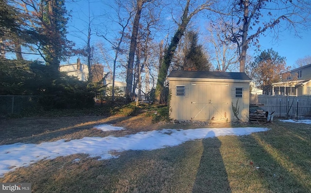 view of outbuilding with a yard