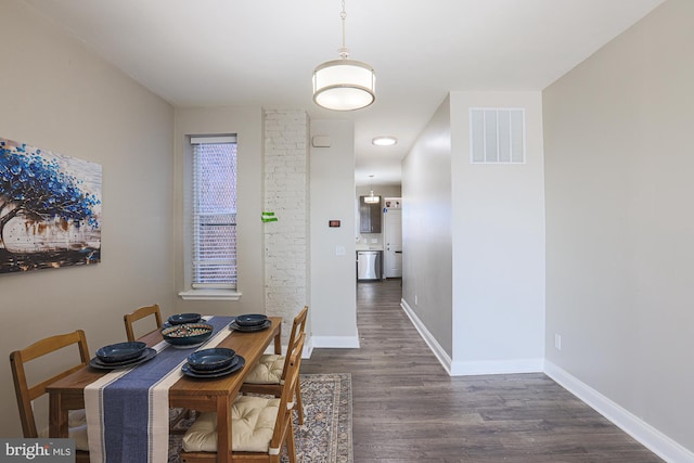 dining room featuring dark hardwood / wood-style floors