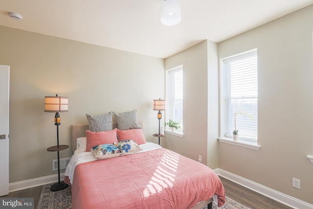 bedroom featuring dark hardwood / wood-style floors