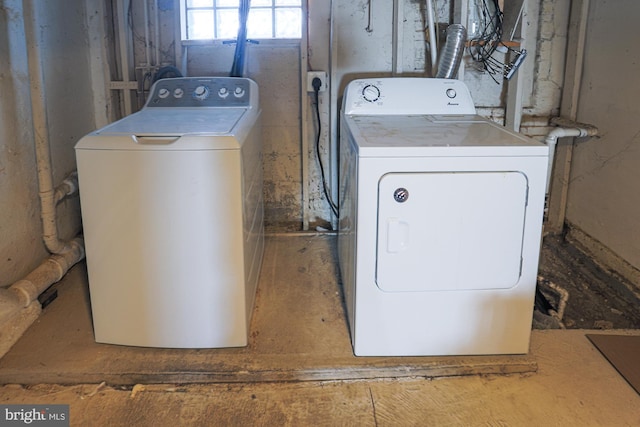 laundry area with washer and clothes dryer