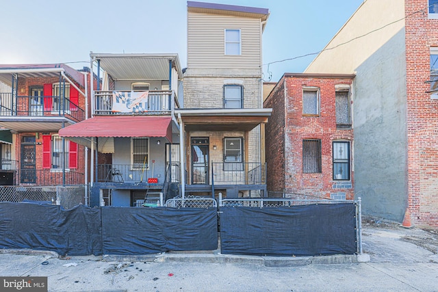 view of property featuring a balcony