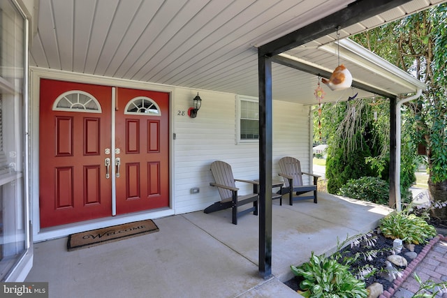 entrance to property with a porch