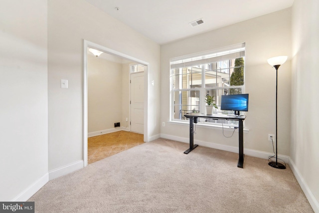 office area with light colored carpet