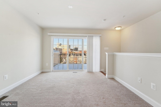 view of carpeted spare room