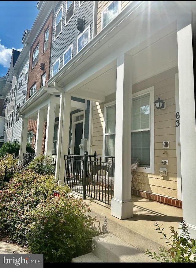 property entrance with a porch