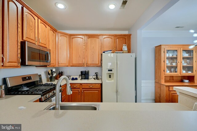 kitchen featuring sink and appliances with stainless steel finishes