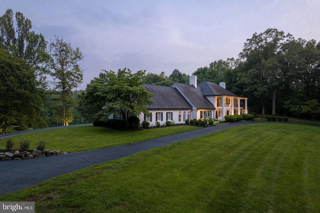 view of front of house with a lawn