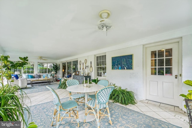 view of patio / terrace featuring ceiling fan and an outdoor living space