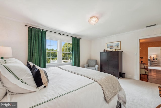 bedroom with crown molding