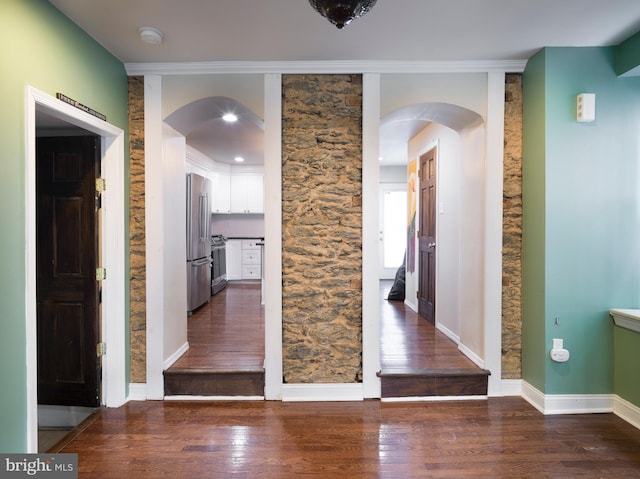 corridor featuring dark hardwood / wood-style floors