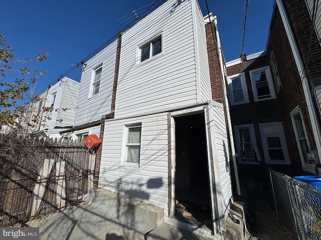 rear view of property with a patio