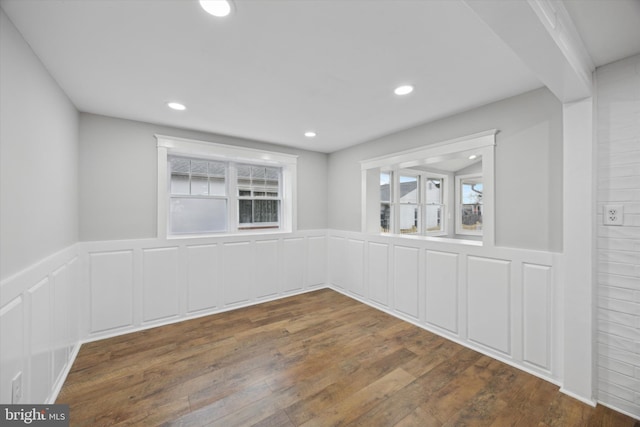 empty room featuring dark hardwood / wood-style floors