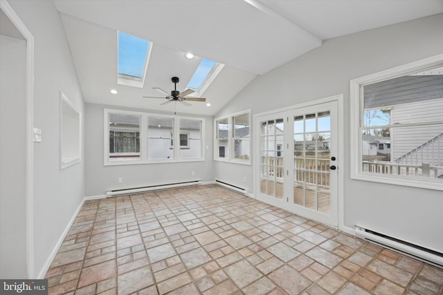 unfurnished sunroom featuring baseboard heating, ceiling fan, and vaulted ceiling with skylight