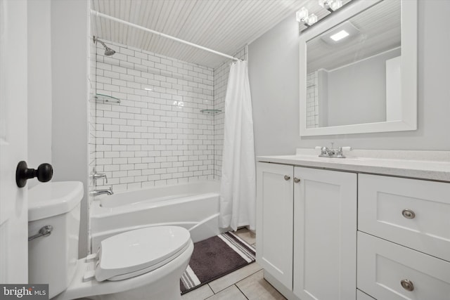 full bathroom with toilet, tile patterned flooring, shower / bath combo, and vanity