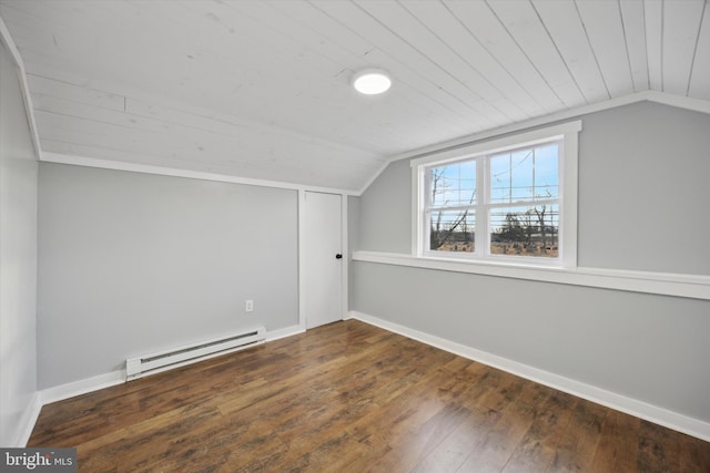 additional living space featuring lofted ceiling, a baseboard heating unit, wood ceiling, and dark hardwood / wood-style floors