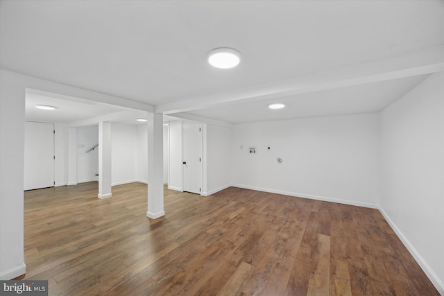 basement with hardwood / wood-style floors