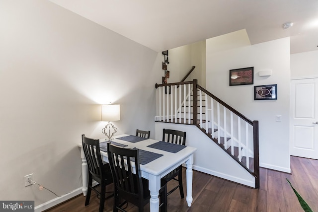 dining room featuring dark hardwood / wood-style flooring