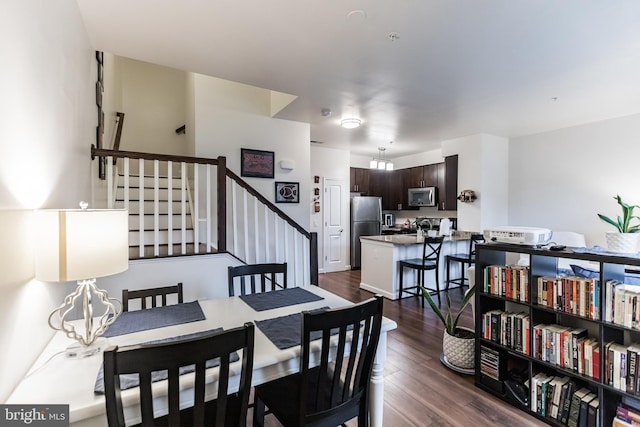 dining room with dark hardwood / wood-style floors