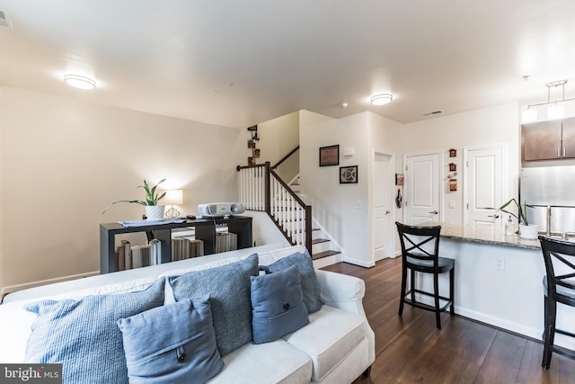 living room with dark wood-type flooring