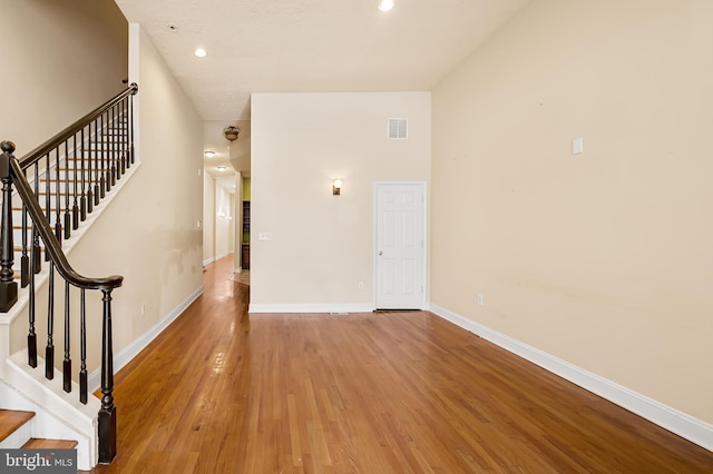 entrance foyer featuring hardwood / wood-style floors