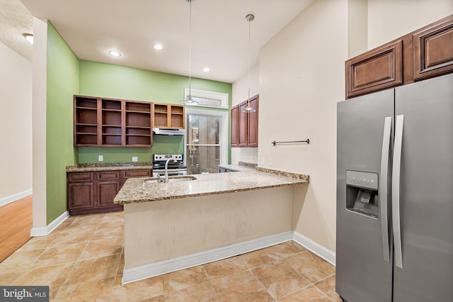 kitchen with sink, kitchen peninsula, stainless steel appliances, and hanging light fixtures