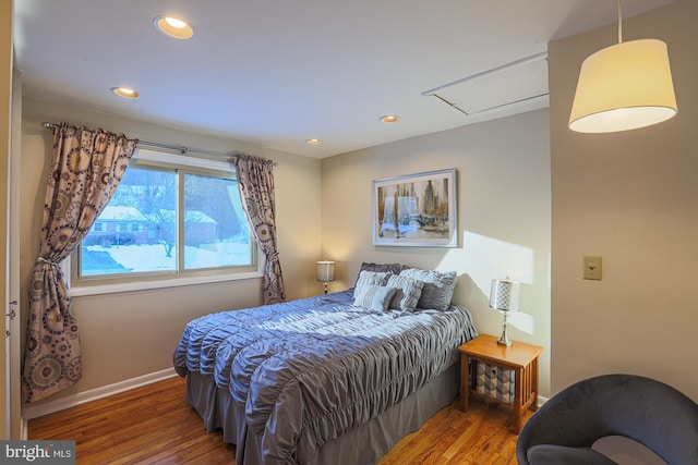 bedroom with dark wood-type flooring