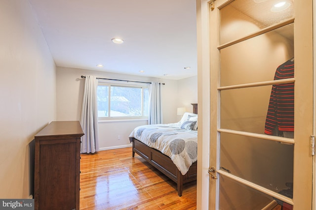 bedroom with light wood-type flooring