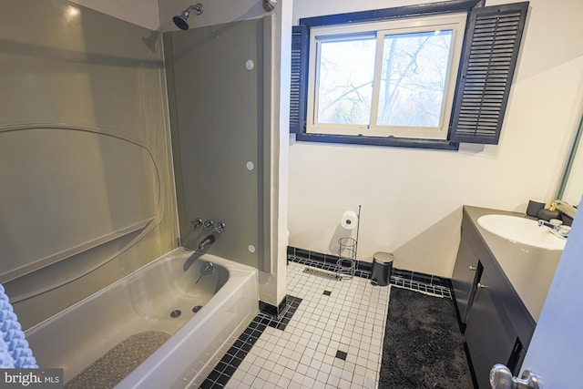 bathroom with vanity, shower / bathtub combination, and tile patterned floors